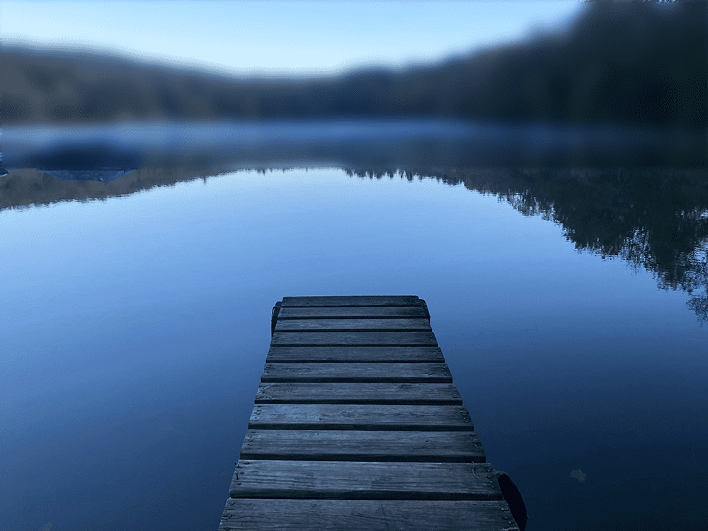 Best Bucket List Ideas: #35 A Peaceful Meditation Spot on Calm Water in the Blue Light Hour