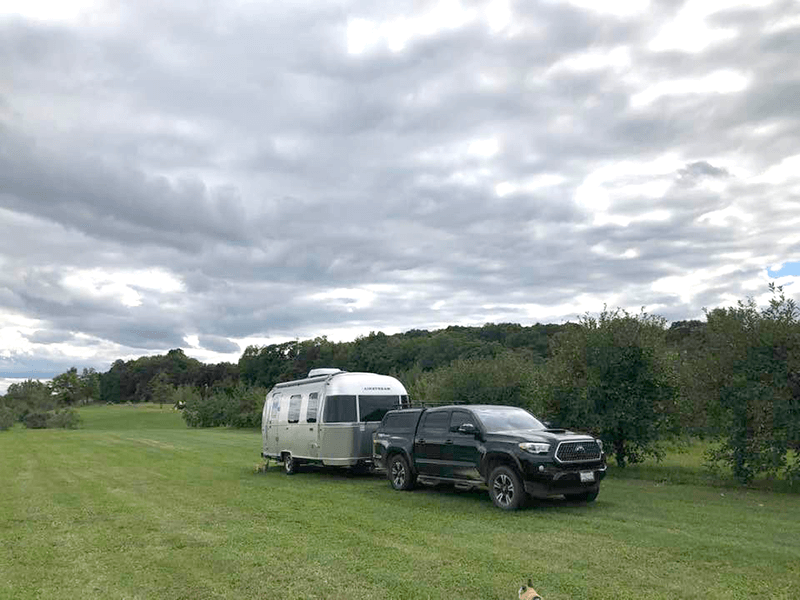 Our Harvest Hosts campsite in an apple orchard in Upstate NY | @Deborah Dennis
